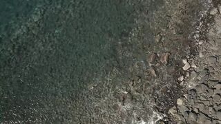 a-man-swimming-in-crystal-clear-water