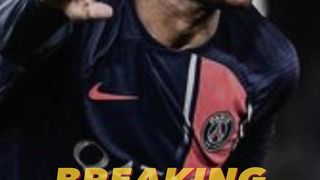 Kylian Mbappe watches the second half of PSG's draw at Monaco in the STANDS after being substituted at half-time.