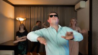 Group of young people dancing indoors