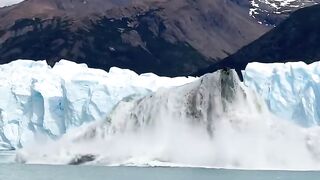 Watch the bottom part of a glacier calving and being pushed to the surface