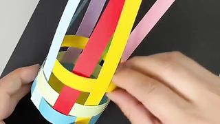 Use colored cardboard strips to make a simple and beautiful weaving pen holder