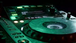 DJ equipment in the room with club lights