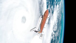 Space shuttle flying through Earth's atmosphere