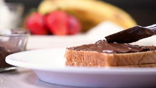 Chocolate or hazelnut cream on white bread