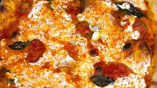 Spicy tomato cream with pickled cherry peppers and honey drizzle Baked for 8min on a baking steel pro