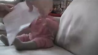 Baby laughs