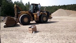 Cute girl operating wheel loader
