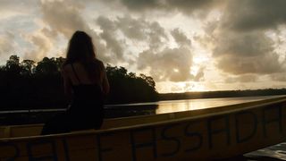 Cinematic shot of friends on a canoe expedition and having their pictures taken.