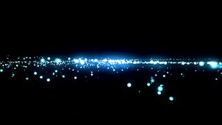 Layer of luminous particles in space