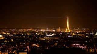 Eiffel tower illuminated at night