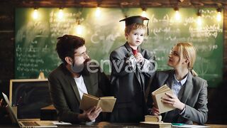 Early Childhood Education: Family Learning Homework - Schoolboy Studies at Home and Embraces Schooling