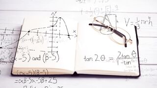 Visualizing Math: Dynamic Equations Unfold Against the Pages of an Open Book