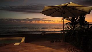 Sunset on a beach seen from a terrace