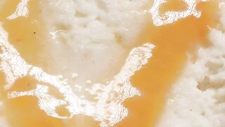 Ice cream with caramel on a black background