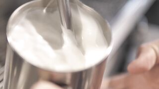 Frothing milk seen in detail.