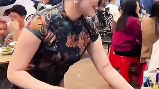 Chinese girl effectively opens beer bottles