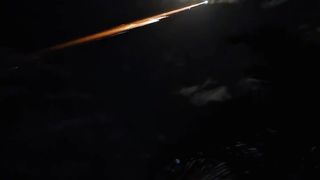 THE FALLEN SATELLITE WRECK LOOKS LIKE A METEOR FALLING TO EARTH