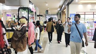 Walk into Crowded Japan Event at Mall