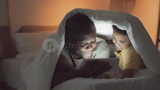 father and son watch phone