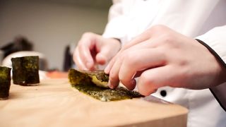 Exquisite Mastery: The Art of Gunkan Nigiri Preparation by a Japanese Chef
