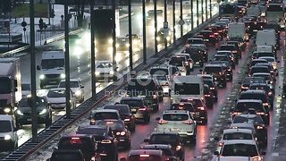 Traffic congestion on the highway at dusk stock video