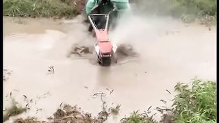 Tractor ???? in water