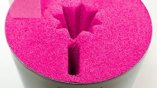 Playing and making shapes with red sponge