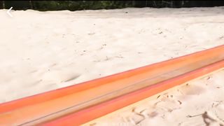 Dad used toy airplanes and off-road vehicle models to make power on the sand...