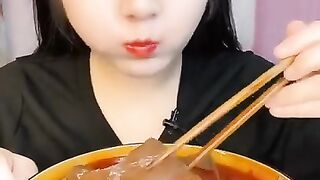 Eating Prawn Kebabs