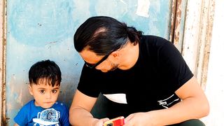 A child helps people and brings bread to the poor
