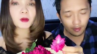 This girl eat rose flower