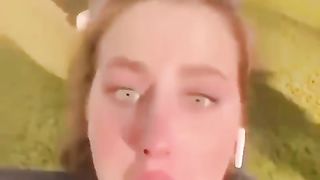 An impudent parrot took the girl's earpiece