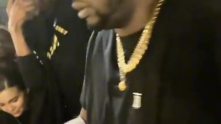 Dj maphorisa throwing money.