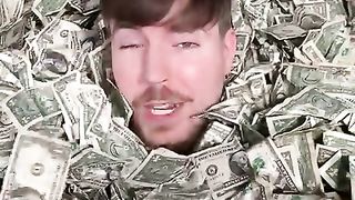 Mr Beast swimming in pool