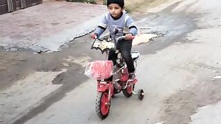 Kid Enjoying bicycle