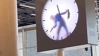 Man+Trapped+In+A+Clock+Amsterdam+Airport