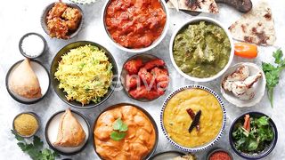 A Gastronomic Journey: Traditional Indian Delicacies Served in Ceramic Bowls