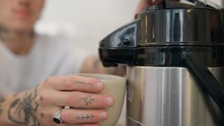 Savoring the Aroma: Close-Up of an Airpot Coffee Dispenser