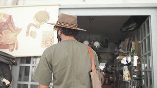 Exploring Treasures: A Man's Journey Into a Souvenir Shop
