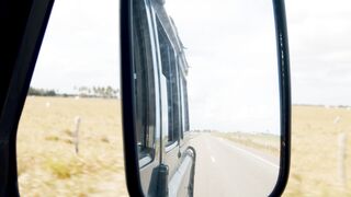 Reflections of the Road: Glancing into the Side Mirror