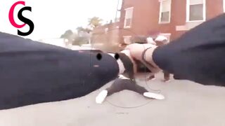 The policeman saves a girl from being assaulted in the street