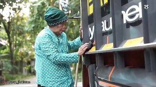 a grandmother drives a mini truck