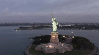 Majestic Icon: Aerial View of the Statue of Liberty in the USA