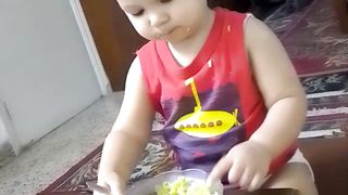 My lovely son starting eating alone