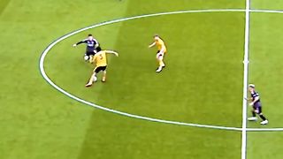 The Algerian player successfully steals the ball from the opponent and dribbles past other players. Excellent left back
