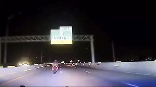 Biker bust up in flames after police tries to tased him
