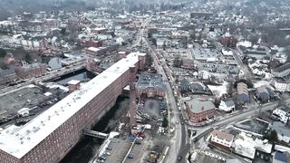 Winter Town Aerial: A Majestic Bird's Eye View of Snow-Covered Scenery