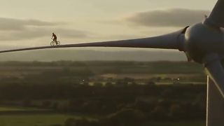 Riding a bike on a wind turbine blade