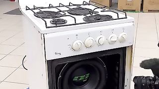 Gas stove with subwoofer and speakers