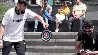 Hitting Apple on stranger head????